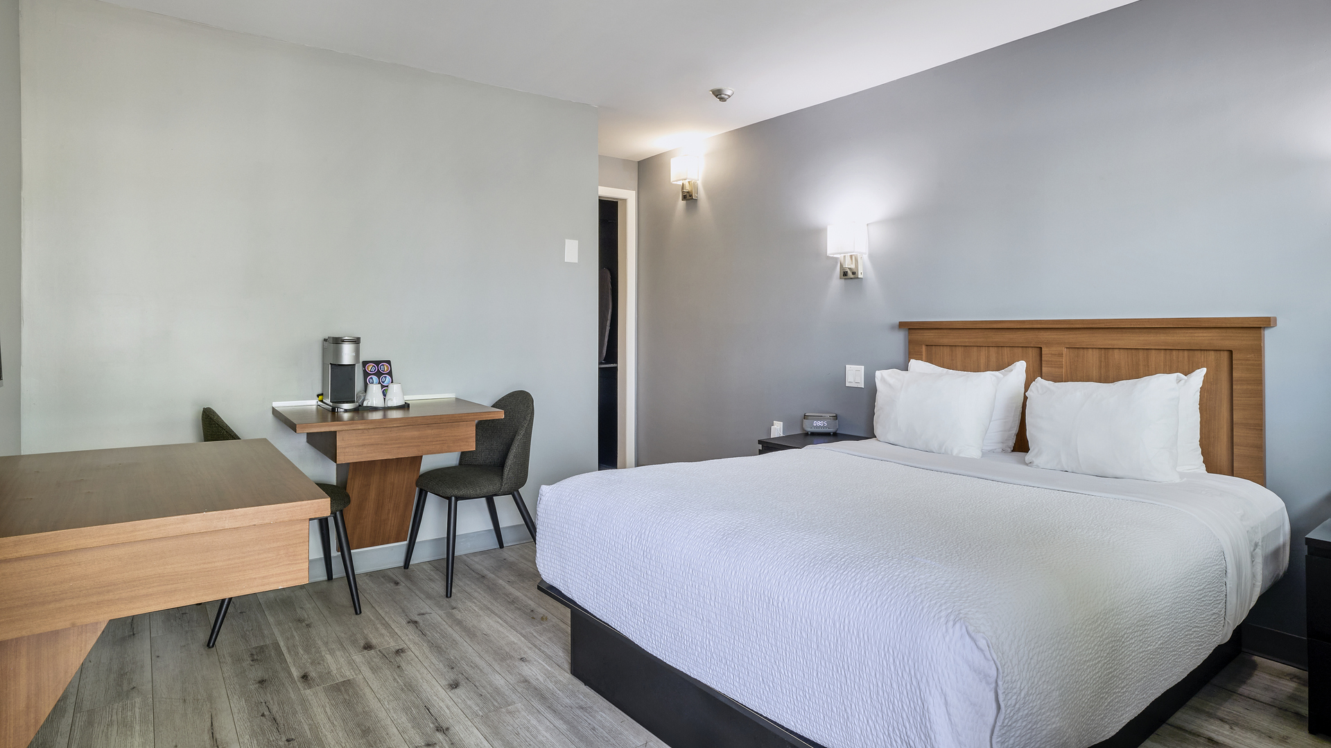 Room with 2 Queen Beds and Sofa Bed